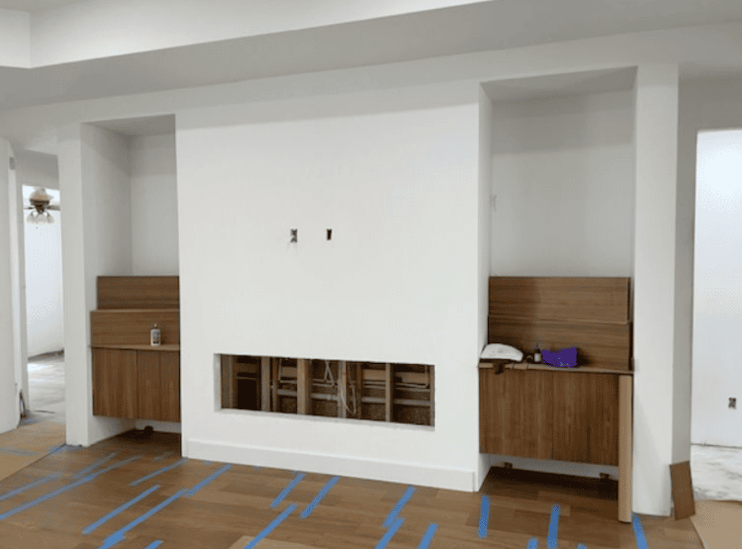 Onyx tile fireplace wall renovation